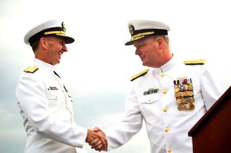 US Navy 110930-N-KK576-074 Chief of Naval Operations (CNO) Adm. Jonathan W. Greenert, left, congratulates Vice Adm. Barry McCullough during a chang