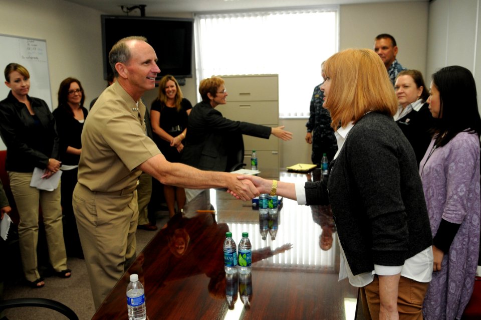 US Navy 111003-N-MU720-042 Chief of Naval Operations (CNO) Adm. Jonathan Greenert, left, meets with staff members of the Fleet Family Support Cente