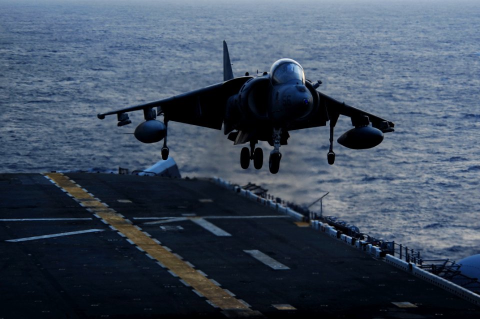 US Navy 111001-N-WA347-172 An AV-8B Harrier assigned to Marine Attack Squadron (VMA) 214 lands aboard the forward-deployed amphibious assault ship