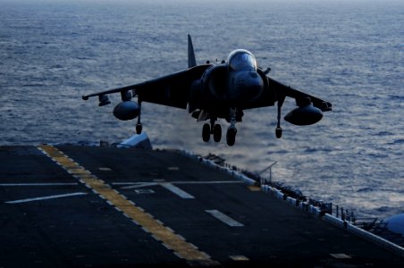 US Navy 111001-N-WA347-172 An AV-8B Harrier assigned to Marine Attack Squadron (VMA) 214 lands aboard the forward-deployed amphibious assault ship