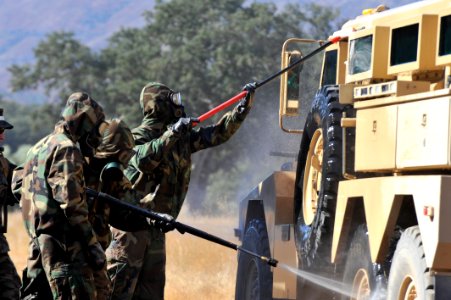 US Navy 110930-N-SM578-182 Seabees assigned to the chemical, biological and radiological decontamination team from Naval Mobile Construction Battal