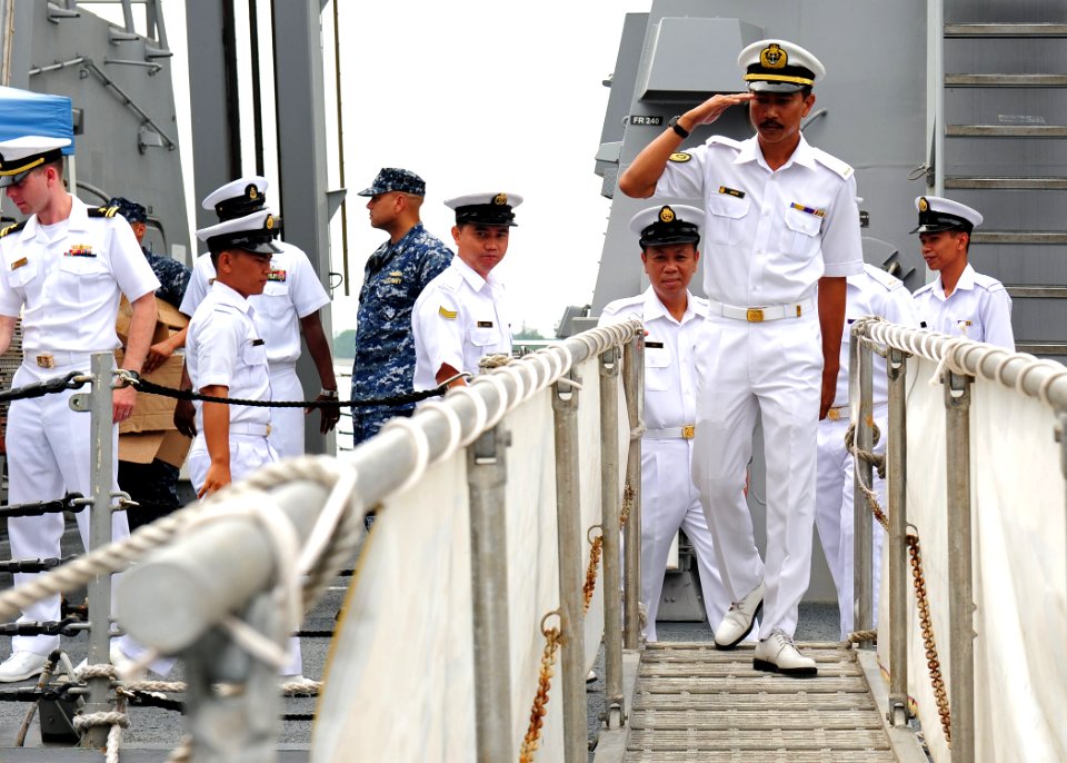 US Navy 111003-N-ED900-130 Royal Brunei Navy members exit across the brow of the Arleigh Burke-class guided-missile destroyer USS Dewey (DDG 105) a