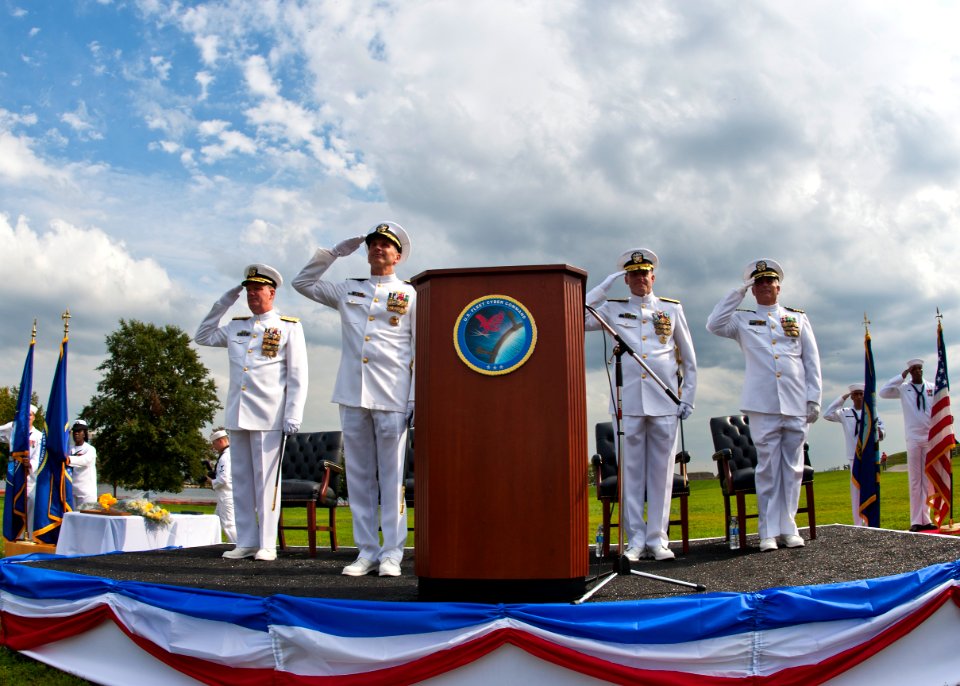 US Navy 110930-N-KK576-352 The official party salutes as the color guard parades the colors during a change of command ceremony at Fort McHenry Nat