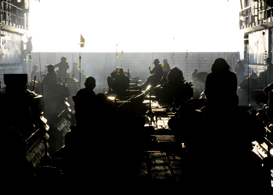 US Navy 110929-N-WJ771-010 Marines assigned to the 31st Marine Expeditionary Unit (31st MEU) prepare to pilot amphibious assault vehicles out of th
