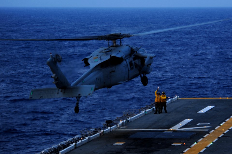 US Navy 111001-N-WA347-198 An MH-60S Sea Hawk helicopter assigned to Helicopter Sea Combat Squadron (HSC) 25 lands aboard the forward-deployed amph