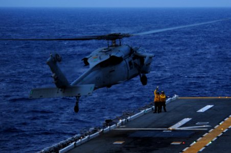 US Navy 111001-N-WA347-198 An MH-60S Sea Hawk helicopter assigned to Helicopter Sea Combat Squadron (HSC) 25 lands aboard the forward-deployed amph