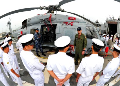 US Navy 111003-N-ED900-102 Lt. Andrew Lukich, assigned to the Raptors of Helicopter Maritime Strike Squadron (HSM) 71, Detachment 4, describes the