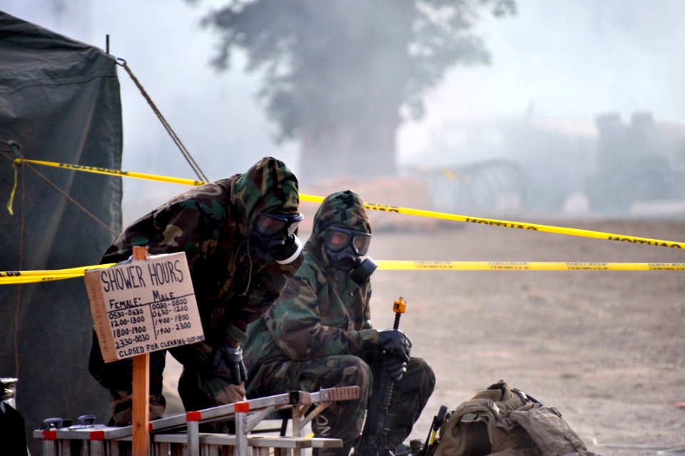 US Navy 110930-N-SM578-205 eabees assigned to Naval Mobile Construction Battalion (NMCB) 40 stand watch during a simulated chemical warfare attack
