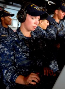 US Navy 111004-N-GH121-029 Seaman Recruit Lisanne King, from Spearfish, S.D., mans a sound-powered telephone on the bridge of the amphibious dock