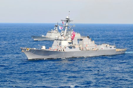 US Navy 111003-N-JO245-103 The Arleigh Burke-class guided-missile destroyer USS Mustin (DDG 89) and the Republic of Korea navy destroyer ROKS Wang