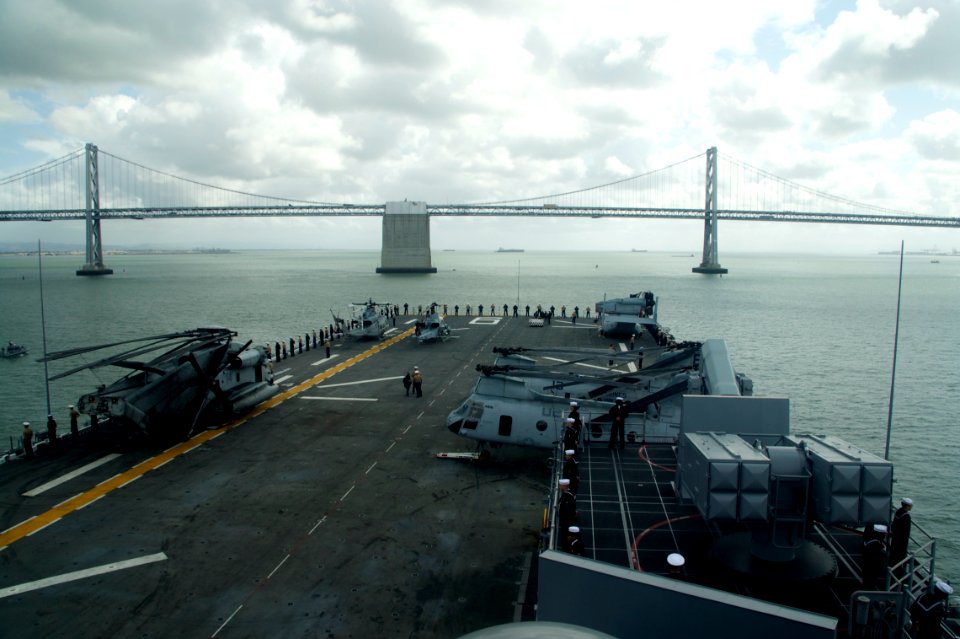US Navy 111005-N-ZC343-156 Sailors and Marines man the rails aboard the amphibious assault ship USS Bonhomme Richard (LHD 6) as the ship arrives in