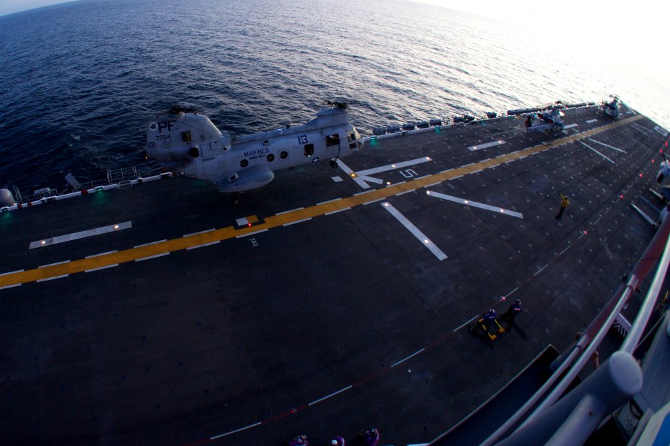 US Navy 111003-N-ZC343-084 Marines assigned to Marine Medium Helicopter Squadron (HMM) 364 practice takeoffs and landings from the amphibious assau