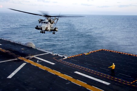 US Navy 111003-N-ZC343-062 Marines assigned to Marine Heavy Helicopter Squadron (HMH) 466 practice takeoffs and landings from the amphibious assaul