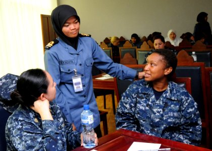 US Navy 111004-N-KK935-024 Chief Fire Controlman Sandra Valdez, left, and Fire Controlman Tanysha Brown, both assigned to the Arleigh Burke-class g