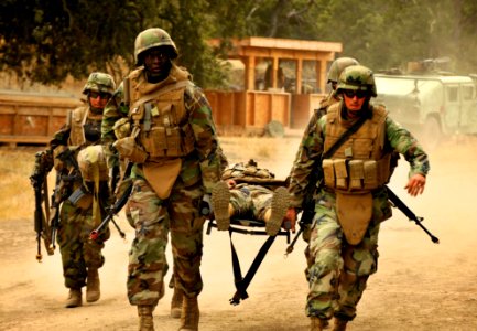 US Navy 111004-N-SM578-291 Seabees assigned to Naval Mobile Construction Battalion (NMCB) 40 conduct a mass casualty drill