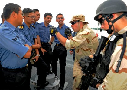 US Navy 111003-N-VH839-009 MUARA, Brunei (Oct. 3, 2011) Fire Controlmen 3rd Class Bryan Courtney, left, and Matthew Burger, members of the visit,