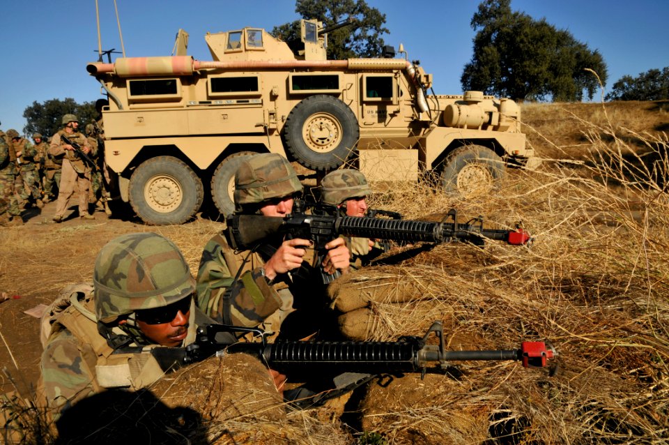 US Navy 111008-N-SM578-036 Seabees assigned to Naval Mobile Construction Battalion (NMCB) 40, defend their camp in a simulated firefight at Forth H