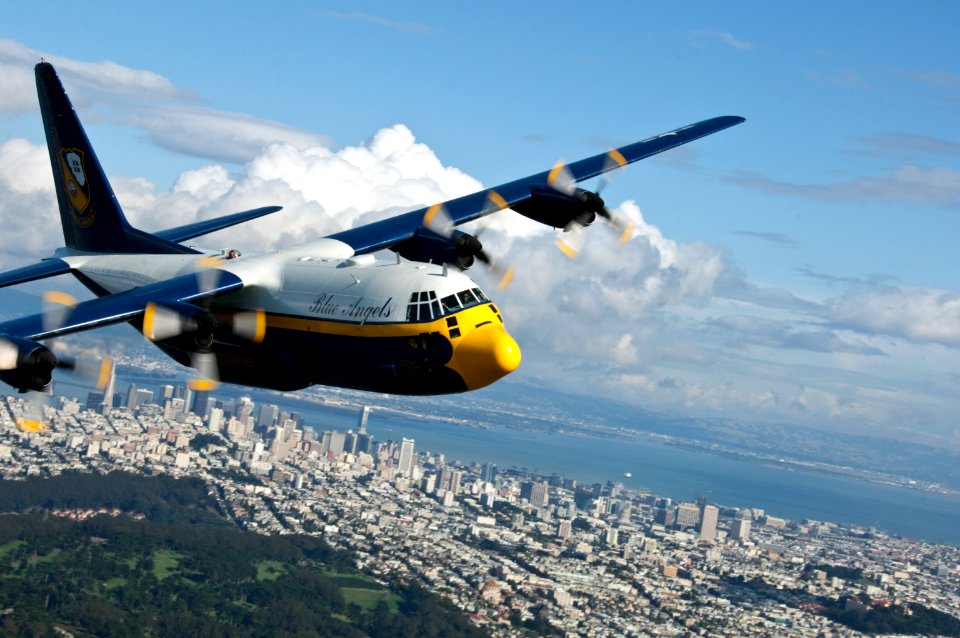 US Navy 111006-N-BA418-043 Fat Albert, the C-130 Hercules assigned to the U.S. Navy Flight Demonstration Squadron, the Blue Angels, flies over San