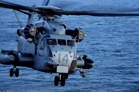 US Navy 111003-N-ZC343-063 Marines assigned to Marine Heavy Helicopter Squadron (HMH) 466 practice takeoffs and landings aboard the amphibious assa