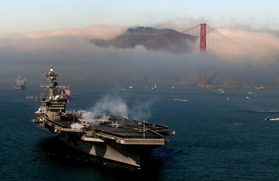 US Navy 111008-N-GZ277-711 The Nimitz-class aircraft Carrier USS Carl Vinson (CVN 70) passes under the Golden Gate bridge during the San Francisco