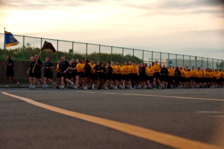 US Navy 111004-N-CZ945-030 Master Chief Petty Officer of the Navy (MCPON) Rick D. West participates in a training run with chief petty officers