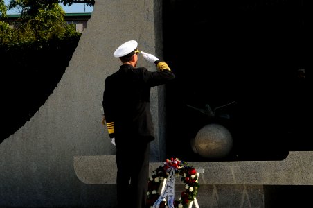 US Navy 111004-N-MU720-013 Chief of Naval Operations (CNO) Adm. Jonathan Greenert pays tribute during a wreath-laying ceremony at the Japan Ministr