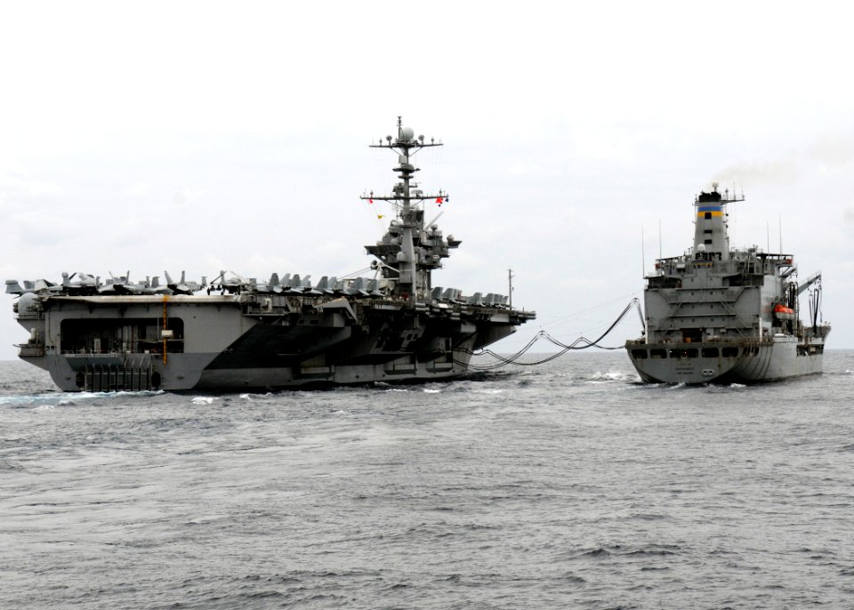 US Navy 111004-N-KB052-006 The aircraft carrier USS George Washington (CVN 73) conducts a replenishment at sea with the Military Sealift Command fl