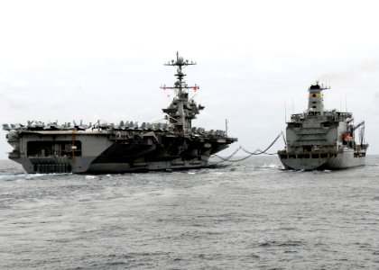 US Navy 111004-N-KB052-006 The aircraft carrier USS George Washington (CVN 73) conducts a replenishment at sea with the Military Sealift Command fl