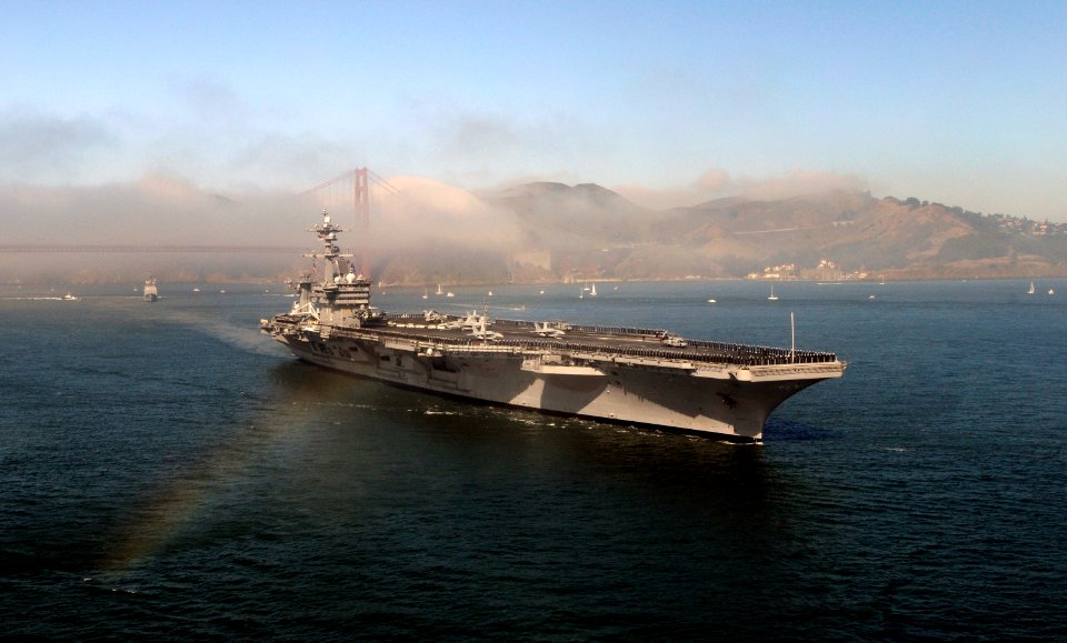 US Navy 111008-N-GZ277-477 The Nimitz-class aircraft Carrier USS Carl Vinson (CVN 70) passes under the Golden Gate bridge during the San Francisco