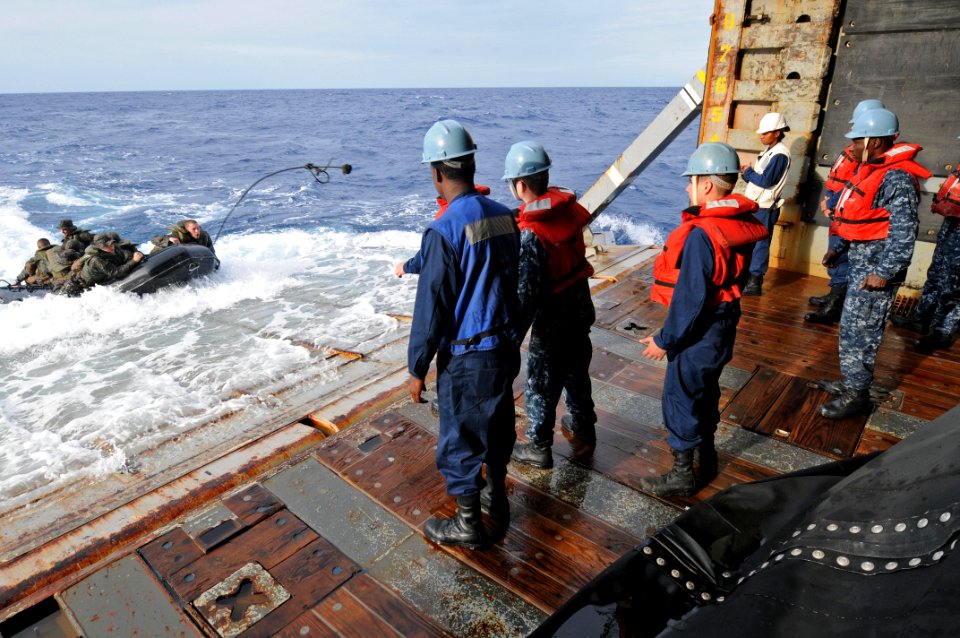 US Navy 111006-N-MW330-731 Sailors prepare to assist Marines assigned to the 31st Marine Expeditionary Unit