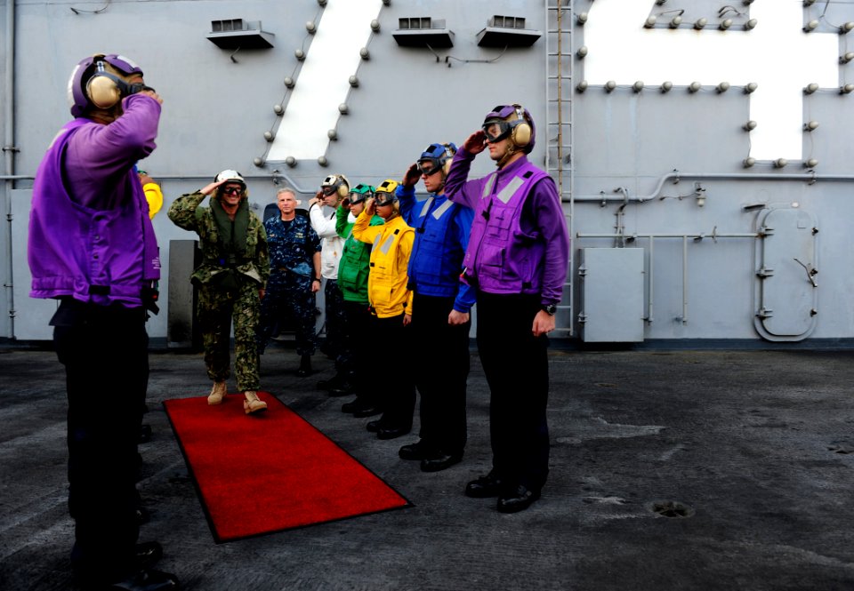 US Navy 111007-N-VN693-681 Chief of Naval Operations (CNO) Adm. Jonathan Greenert departs the Nimitz-class aircraft carrier USS John C. Stennis (CV