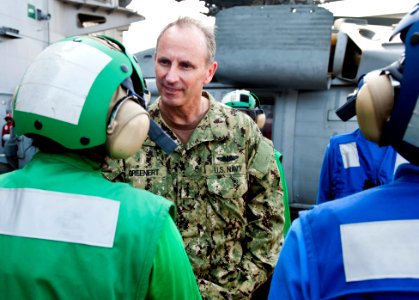 US Navy 111008-N-BT887-682 Chief of Naval Operations (CNO) Adm. Jonathan W. Greenert arrives aboard the Nimitz-class aircraft carrier USS John C. S