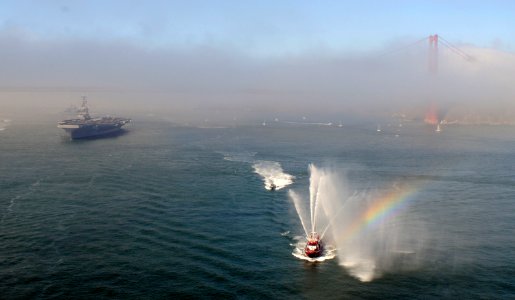 US Navy 111008-N-GZ277-306 The Nimitz-class aircraft Carrier USS Carl Vinson (CVN 70) passes under the Golden Gate bridge during the San Francisco