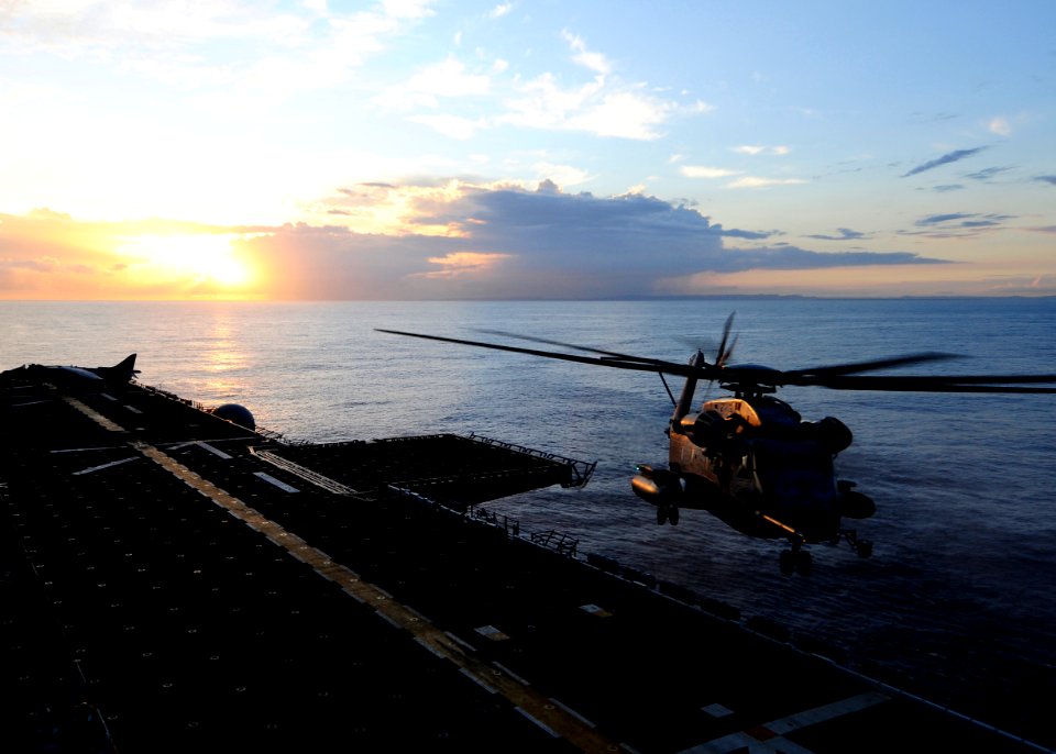 US Navy 111011-N-WJ771-305 A CH-53E Sea Stallion assigned to Marine Medium Helicopter Squadron (HMM) 265 prepares to land aboard the forward-deploy