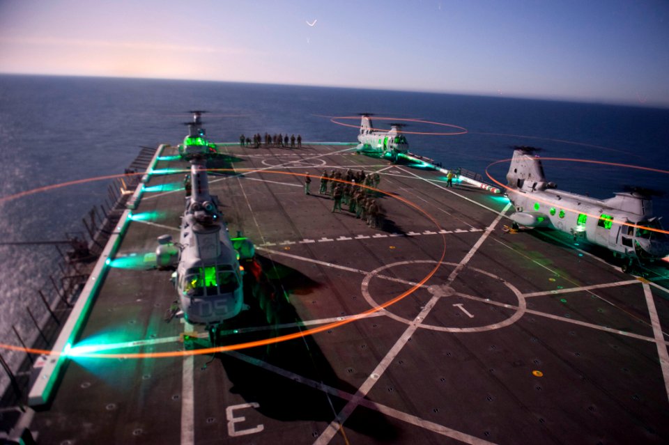 US Navy 111009-N-PB383-157 Marines assigned to the 11th Marine Expeditionary Unit (11th MEU) Maritime Raid Force prepare for an exercise on the fli