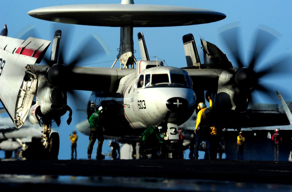 US Navy 111009-N-VN693-670 Sailors prepare an E2-C Hawkeye assigned to the Golden Hawks of Airborne Early Warning Squadron (VAW) 112 for launch
