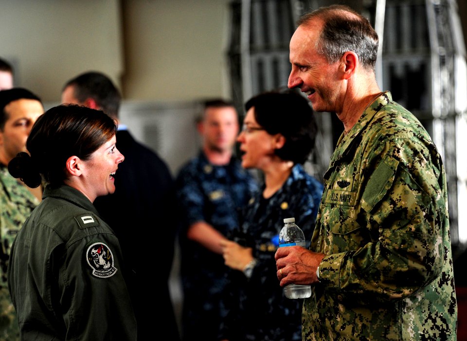 US Navy 111008-N-VN693-168 Chief of Naval Operations (CNO) Adm. Jonathan Greenert speaks to Lt. Sara Donnelly, from Norfolk, Va., during a visit ab