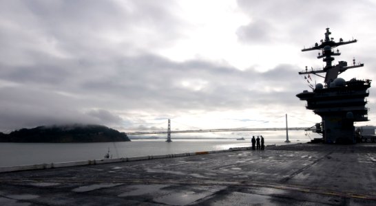 US Navy 111011-N-OK922-153 The Nimitz-class carrier USS Carl Vinson (CVN 70) passes the Golden Gate Bridge