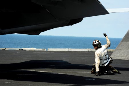US Navy 111012-N-ZZ999-150 Aviation Electrician's Mate 2nd Class Matthew King gives the thumbs up for the launch of an F-A-18E Super Hornet assigne
