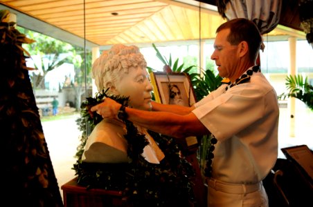 US Navy 111011-N-WP746-041 Rear Adm. Dixon Smith, commander of Navy Region Hawaii, offers a lei to the bust of Bernice Pauahi Bishop, the founder o