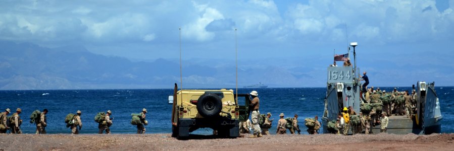 US Navy 111012-N-KA046-236 Marines assigned to the 22nd Marine Expeditionary Unit (22nd MEU) wait for a landing craft utility (LCU) photo