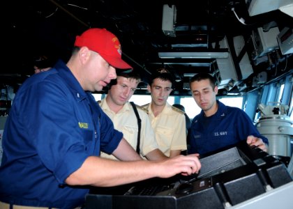 US Navy 111013-N-UE250-063 Lt. j.g. Cory Massey, assigned to the forward deployed Arleigh Burke-class guided-missile destroyer USS Fitzgerald (DDG