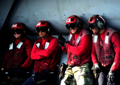 US Navy 111012-N-VN693-461 Sailors take a group photo after flight operations aboard the aircraft carrier USS John C. Stennis (CVN 74)