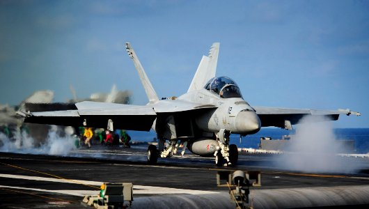 US Navy 111012-N-VN693-216 A F-A-18F Super Hornet assigned to the Black Aces of Strike Fighter Squadron (VFA) 41 launches from the aircraft carrier
