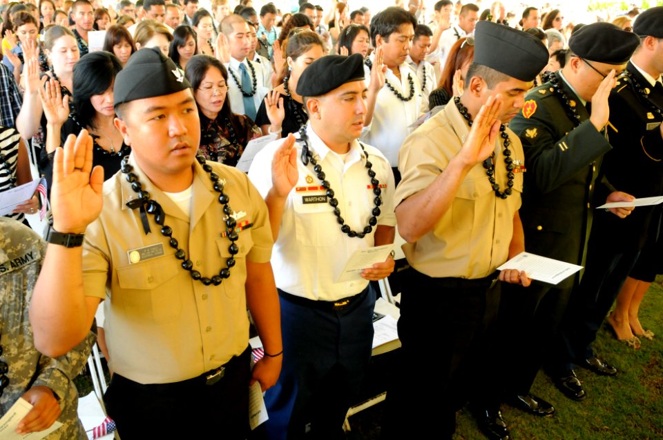 US Navy 111012-N-WP746-059 Electrician's Mate 3rd Class Rudy Pablo, left, assigned to the guided-missile cruiser USS Lake Erie (CG 70), recites the
