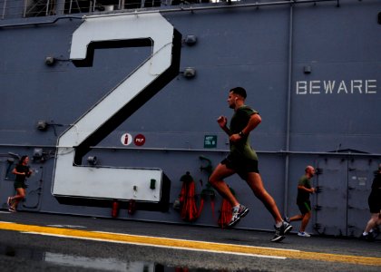 US Navy 111011-N-WJ771-157 Marines assigned to the 31st Marine Expeditionary Unit (31st MEU) exercise on the flight deck of the forward-deployed am