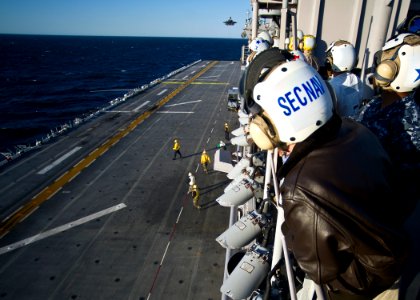 US Navy 111015-N-AC887-001 Secretary of the Navy (SECNAV) the Honorable Ray Mabus observes as an F-35B Lightning II takes off from the amphibious a