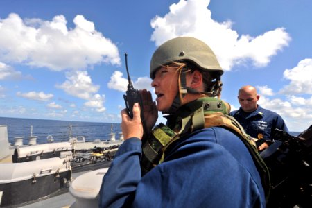 US Navy 111012-N-YZ751-047 Gunner's Mate Seaman Lauren Hanley relays information during an anti-terrorism-force protection drill