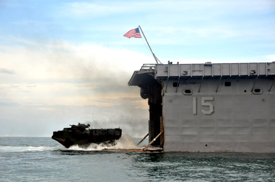 US Navy 111012-N-YX169-337 An amphibious assault vehicle assigned to the 2nd Marine Division from Camp Lejeune, N.C, drives off the stern gate of t