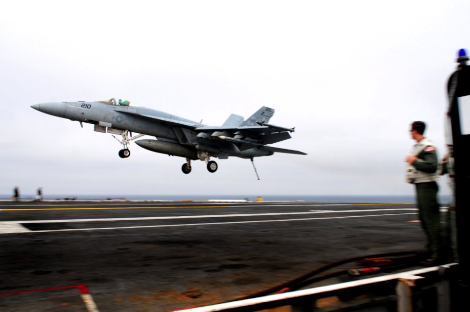 US Navy 111014-N-UO379-128 An F-A-18E Super Hornet assigned to the Argonauts of Strike Fighter Squadron (VFA) 147 prepares to land aboard the aircr